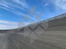 Slighlty sloping race track close to Madrid secured with steel safety barriers created by Meiser Straßenausstattung.