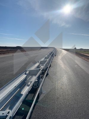 Part of the test track at the state-of-the-art Test and Technology Centre south of Madrid, showing a close-up of the simple distance guardrails (EDS) manufactured by Meiser Straßenausstattung.